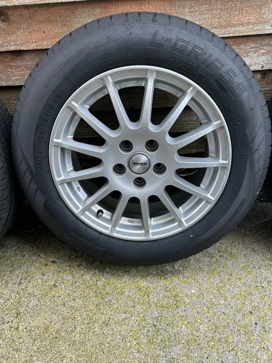 14” Alloys, brand new tires - Image 1