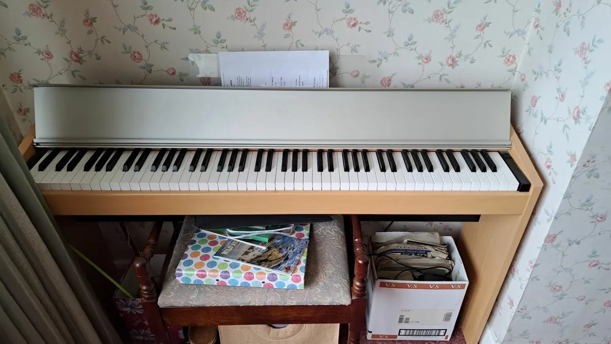 Roland F100 digital piano - Image 1