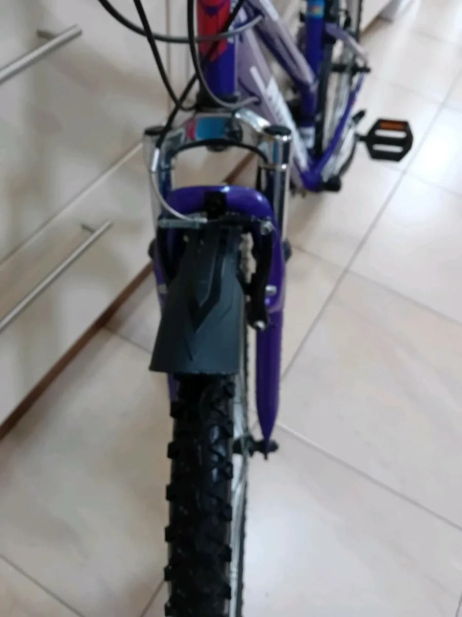 GIRLS BIKE 24 INCH WHEELS AS NEW - Image 1