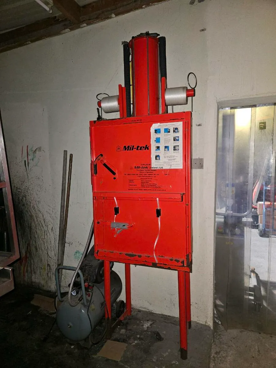 Waste Compactor with compressor.