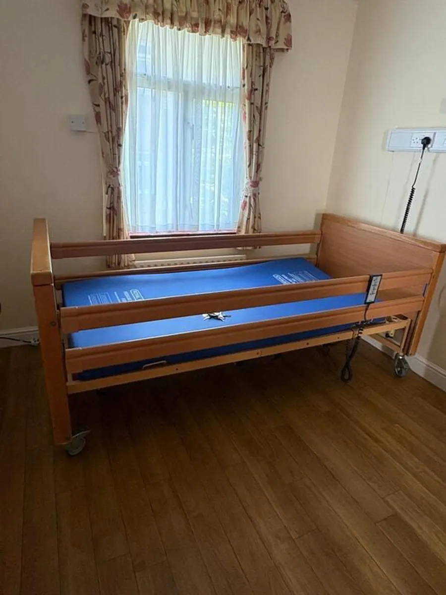 Fully serviced electric Hospital beds (including low profiling) along with remote control and medical mattress in excellent condition - Image 1
