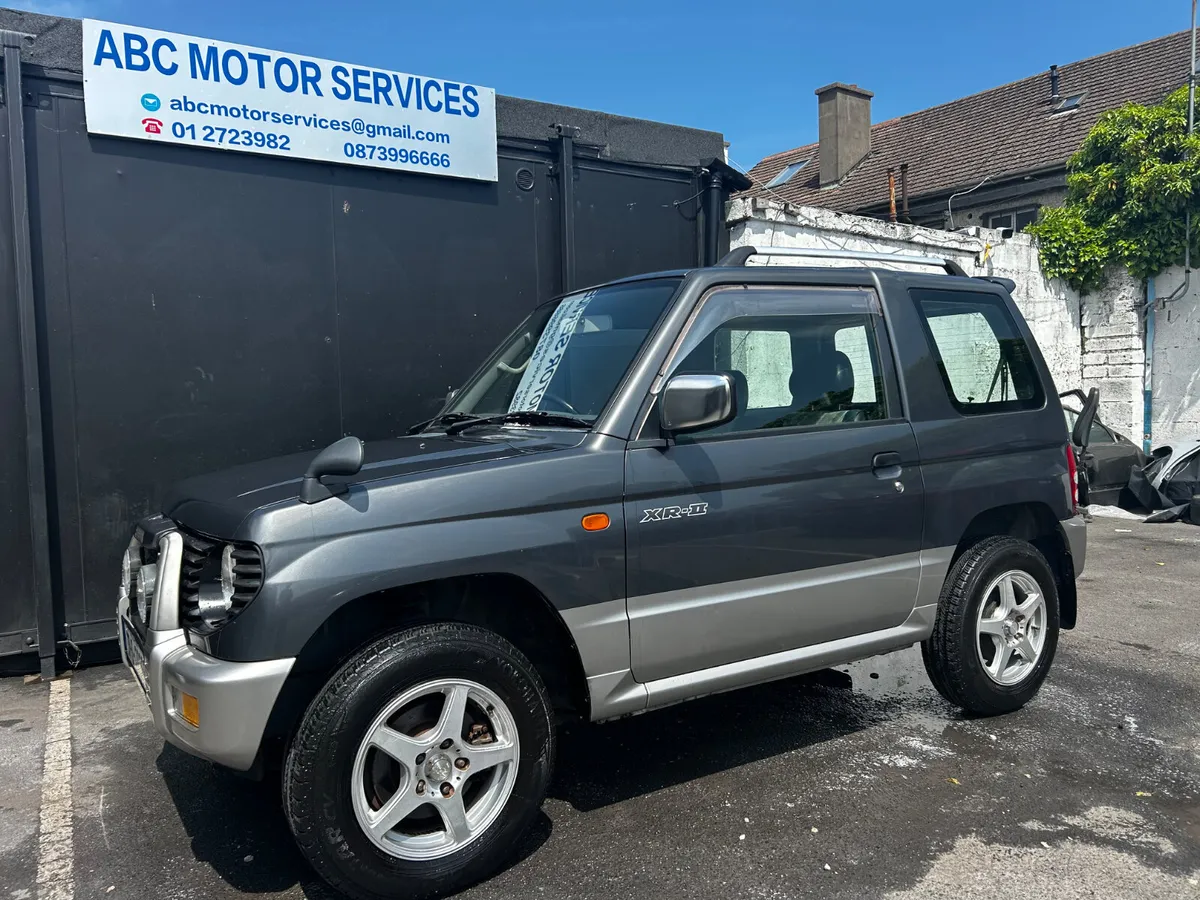 1997 MITSUBISHI PAJERO MINI LOW KMS PETROL AUTO - Image 1