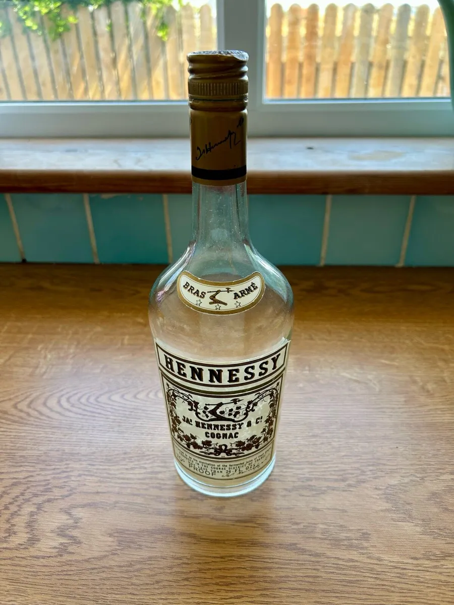Vintage Hennessy bottle with cover - Image 3