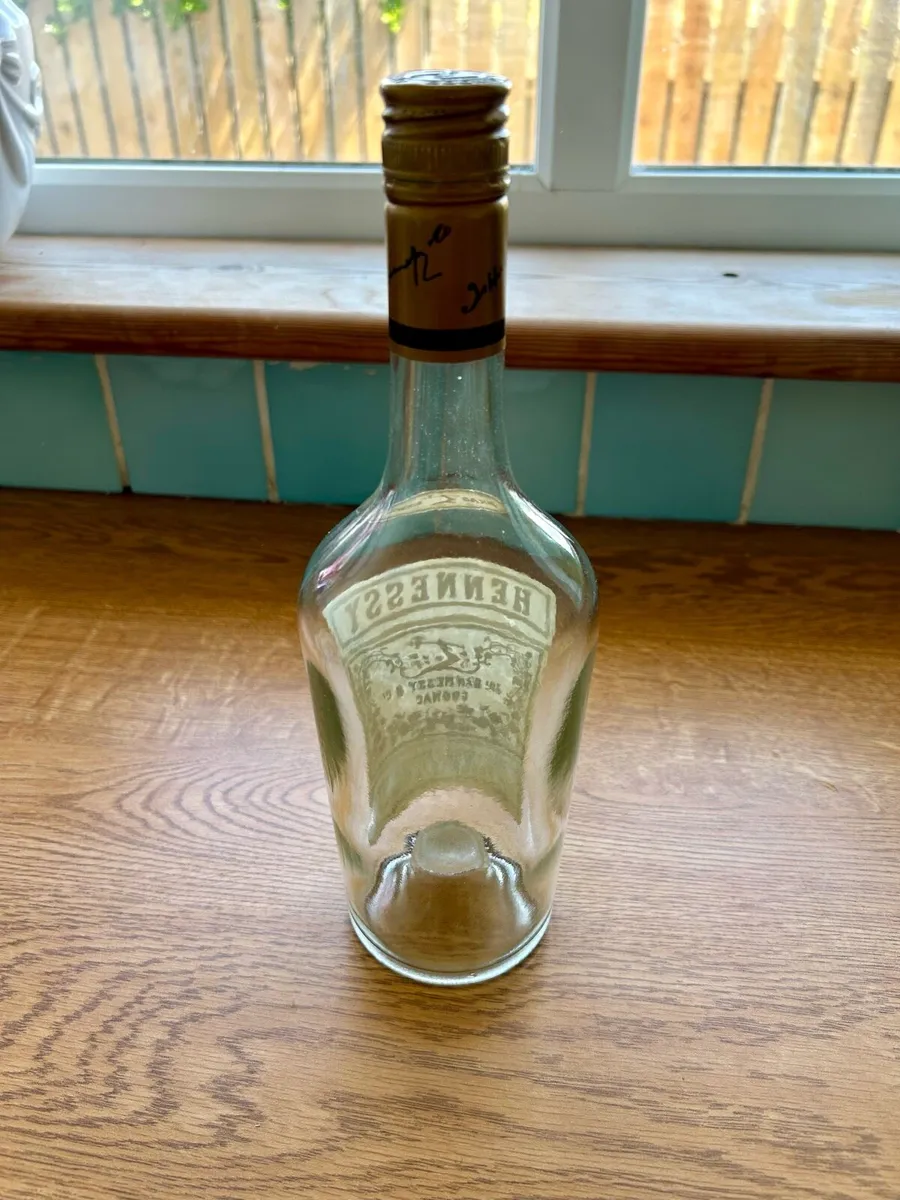 Vintage Hennessy bottle with cover - Image 4