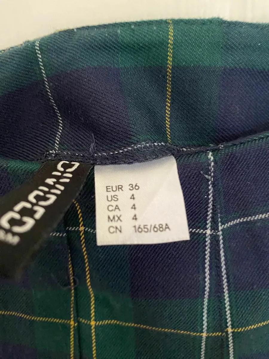 Short checked mini skirt - Image 1