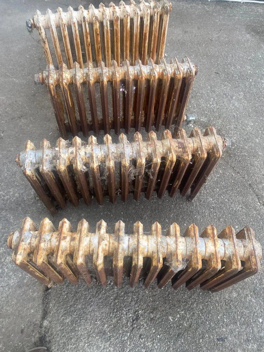 Old cast iron Radiators ,new unused Freezer - Image 1