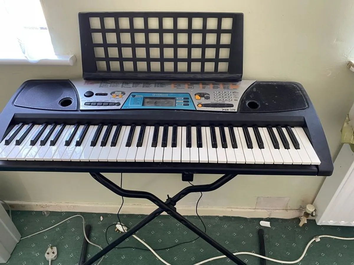 Yamaha Keyboard and stand plus manual