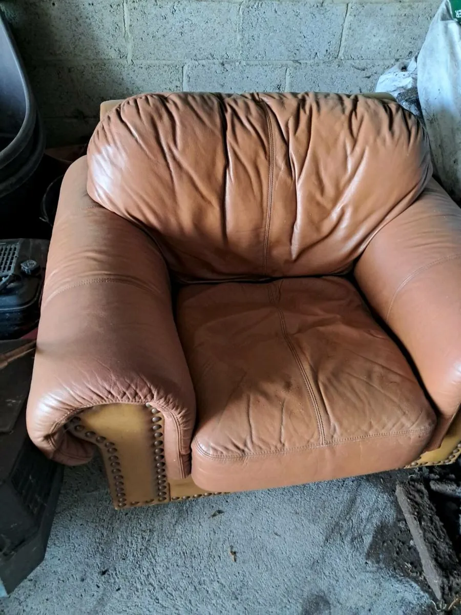 Single tan brown leather chair