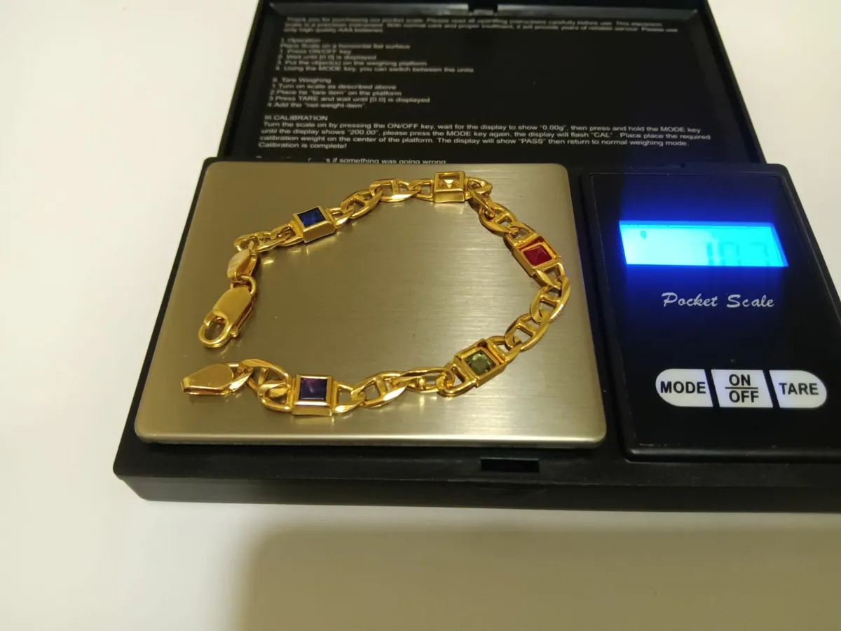 14ct gold bracelet with stones - Image 1
