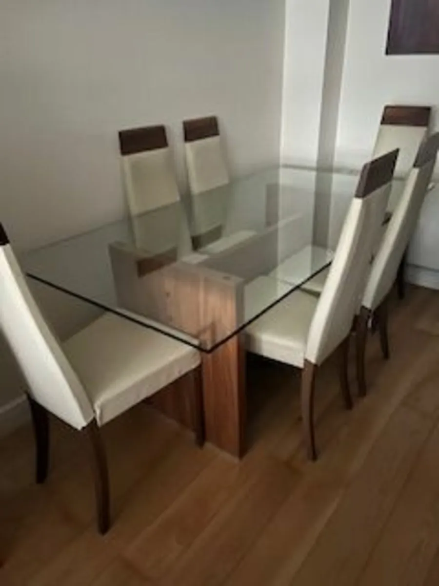 Glass Dining Table and 6 leather chairs - Image 1