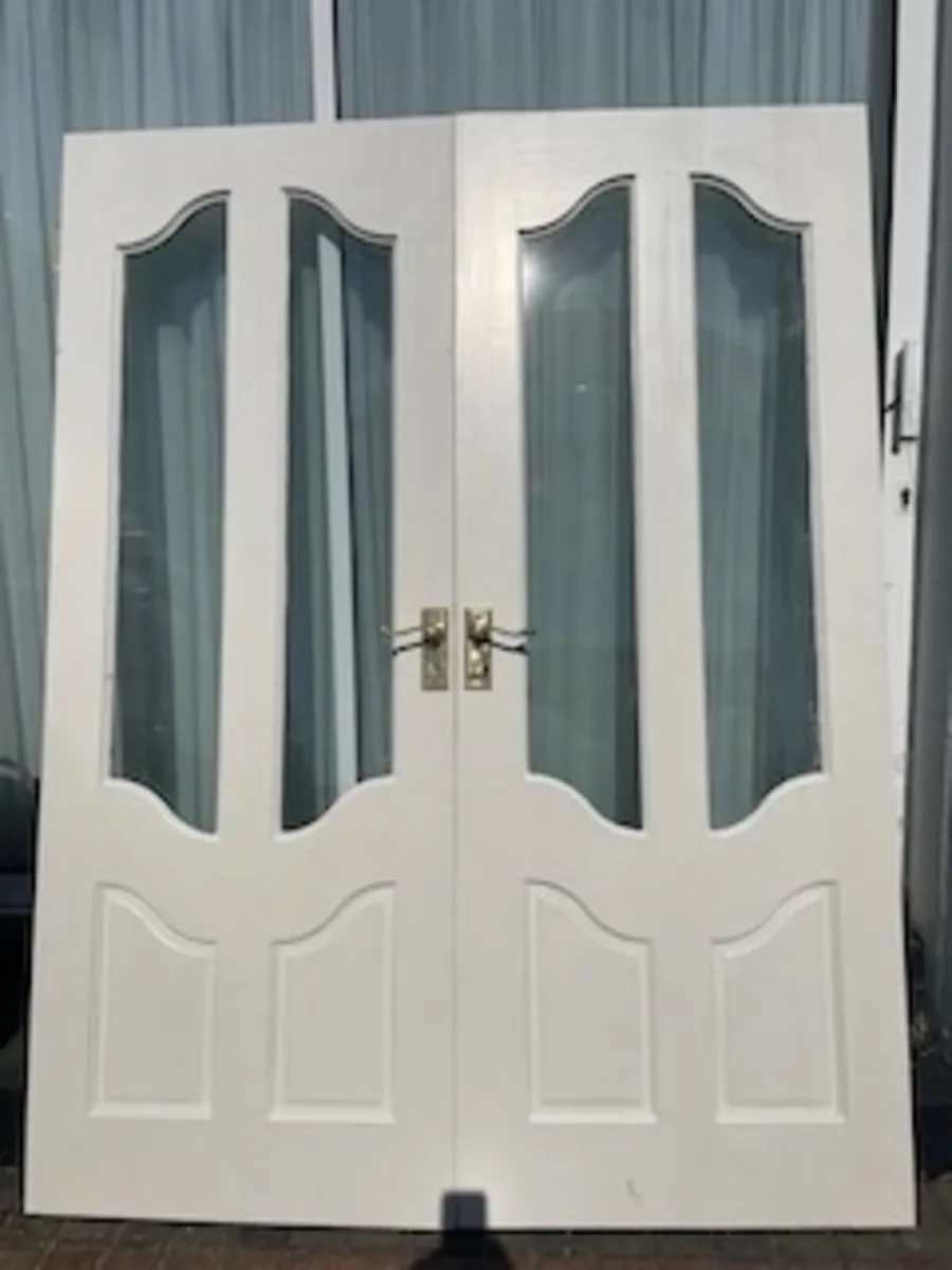 Double white internal doors with glass
