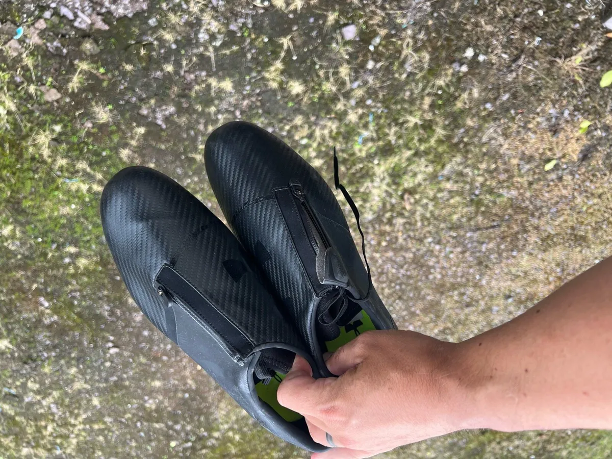 Two pairs of football boots one new - Image 2