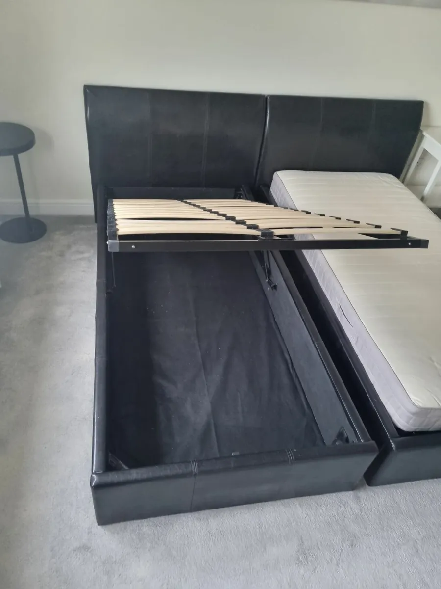 Bed frame, black leather with under storage - Image 1