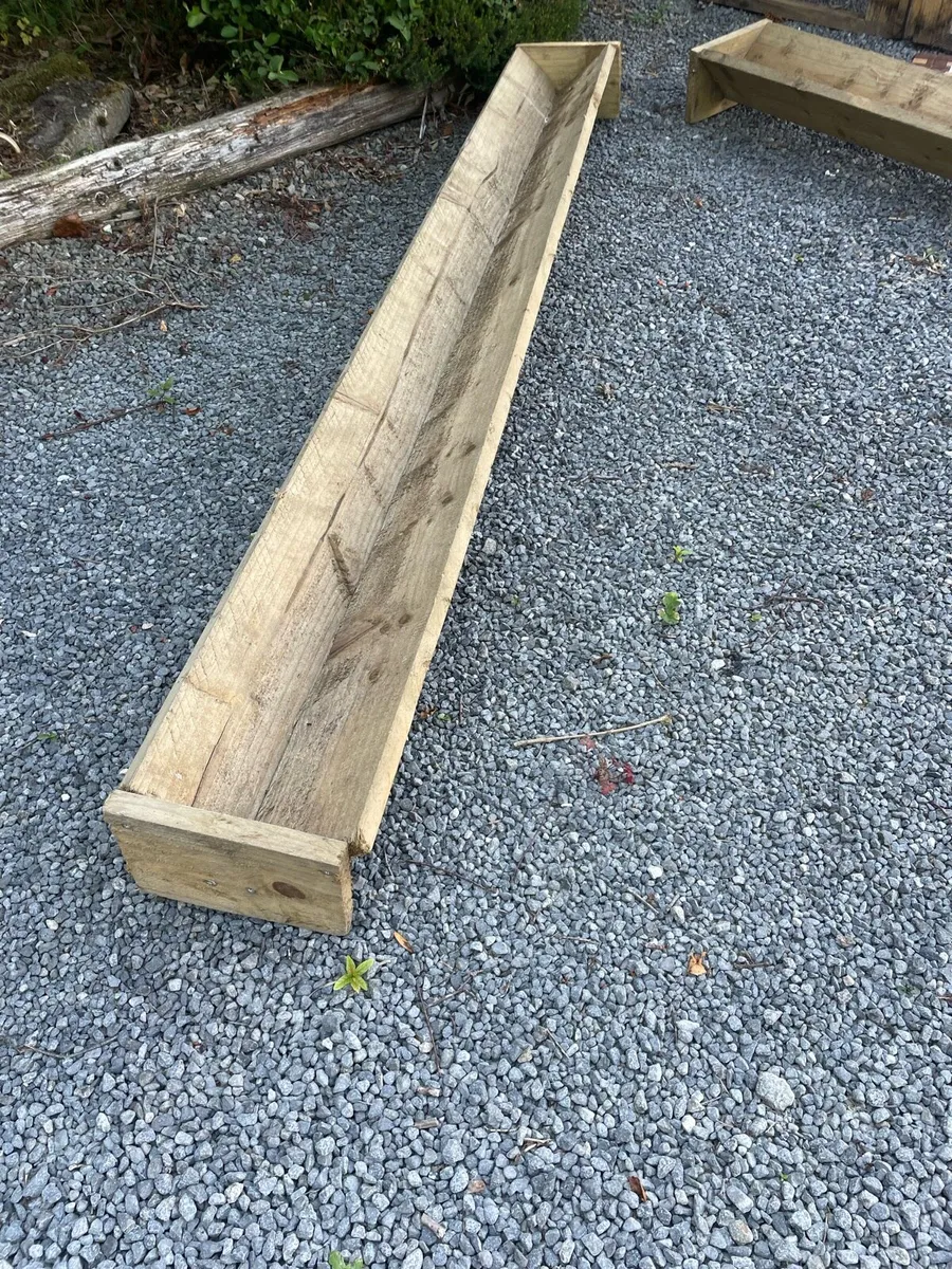 Wooden feeding troughs - Image 1