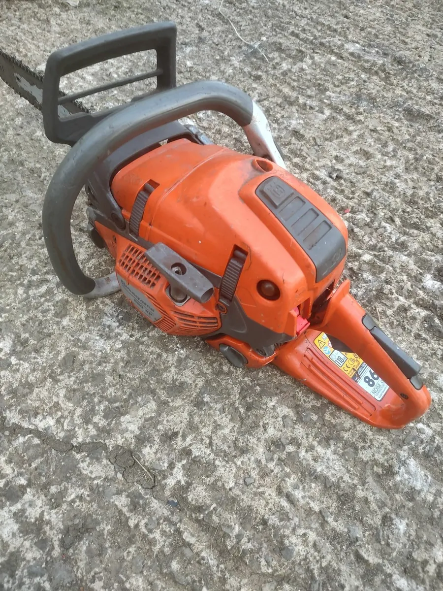 Husqvarna 560XP Chainsaw - Image 1