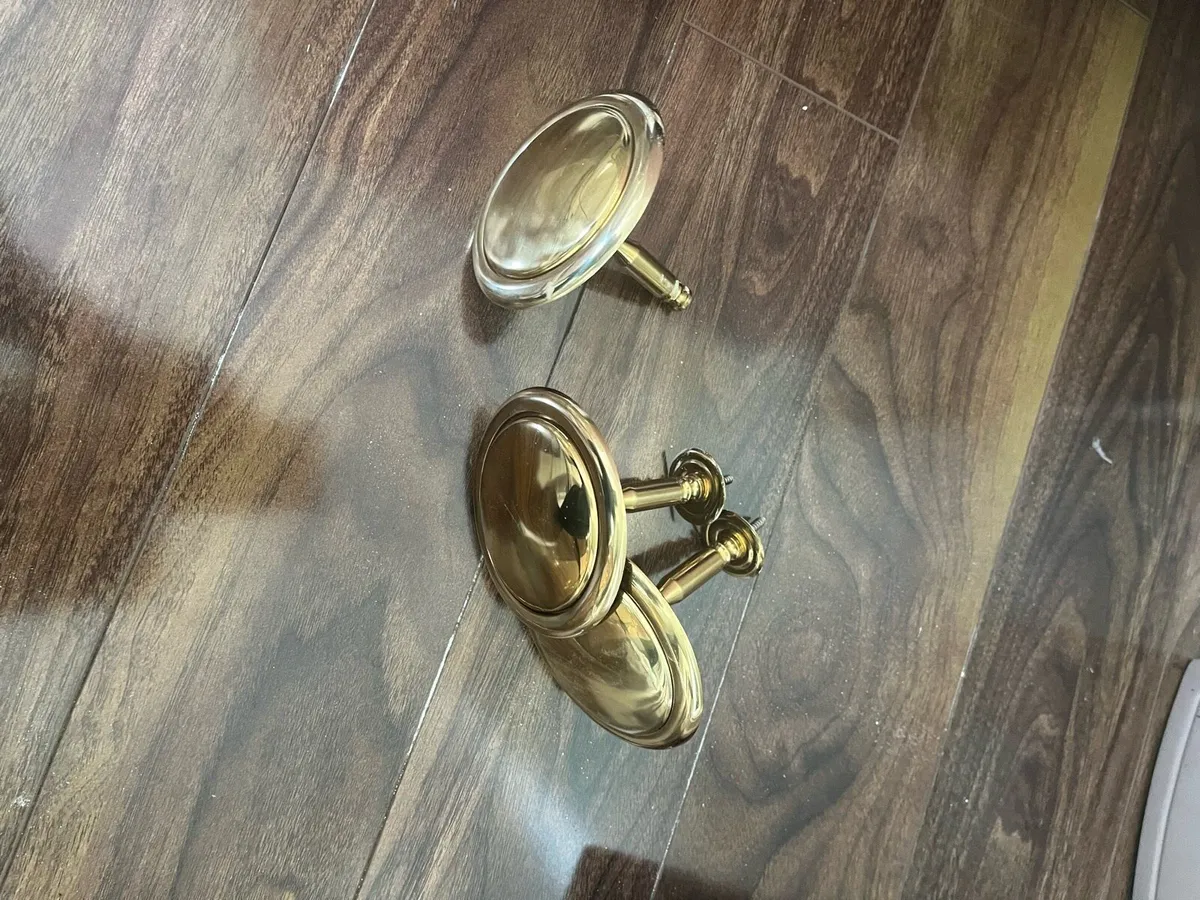 Tie back holders