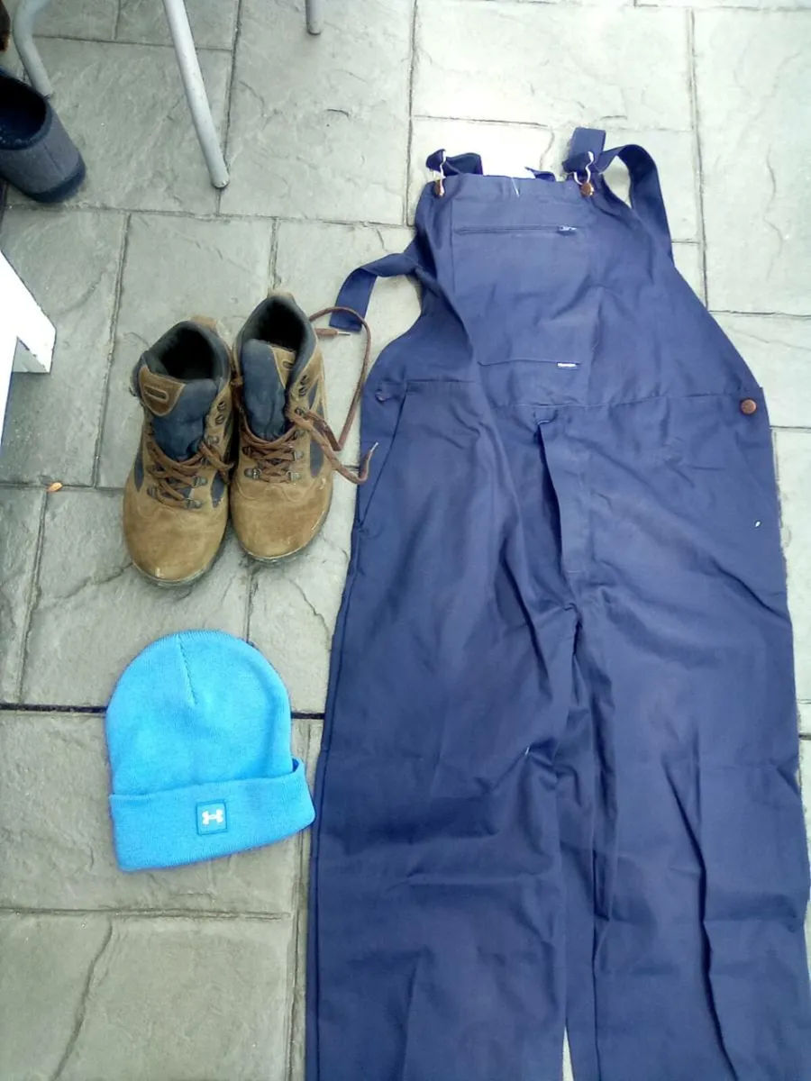 NEW. OVERALLS . A HAT . AND  PAIR OF HIKING BOOTS - Image 2