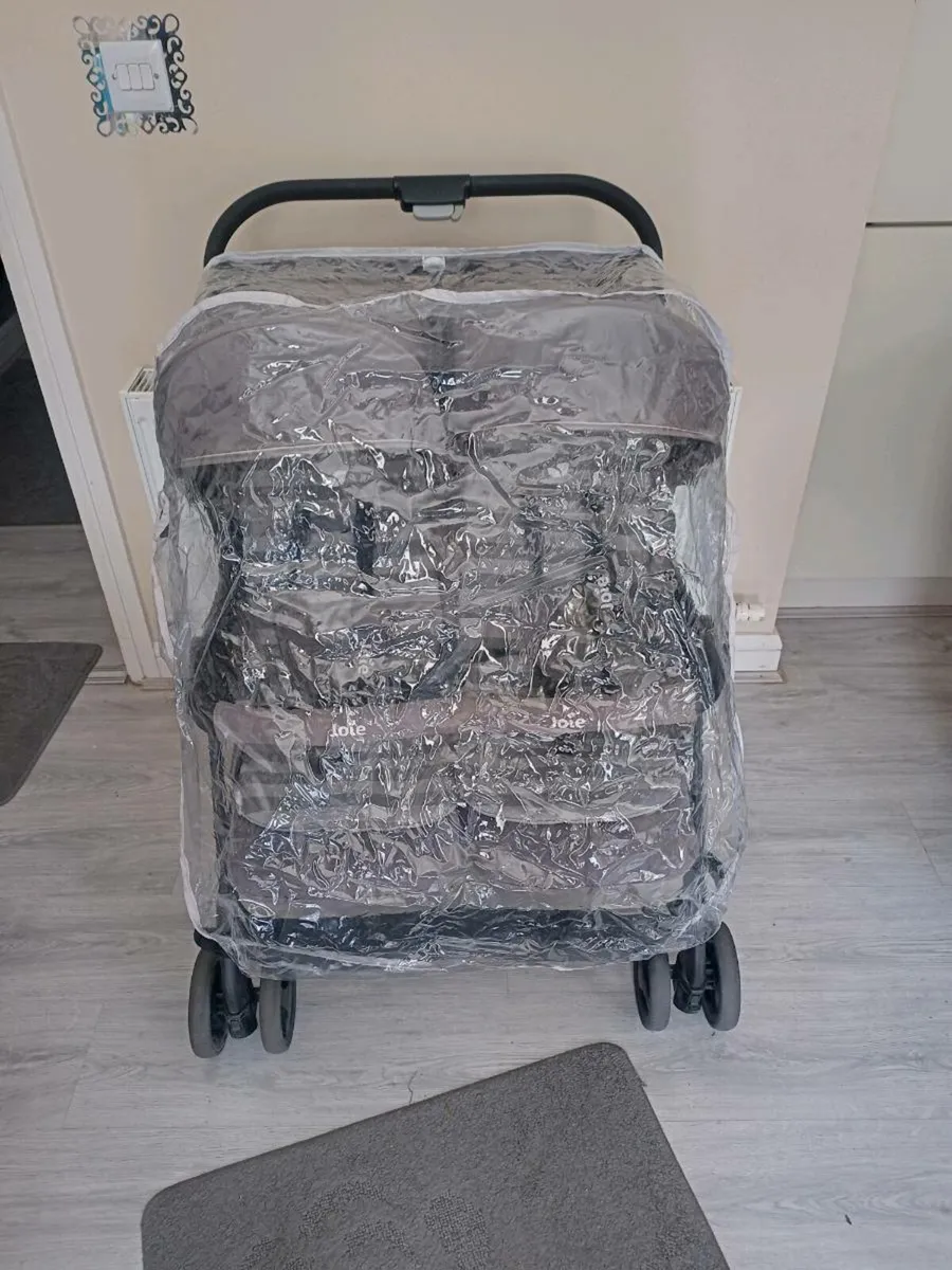Joie baby's double buggy. With rain cover - Image 1