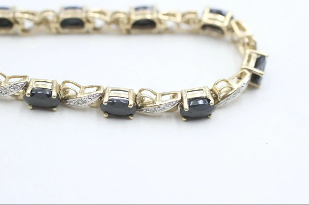 Diamond yellow gold tennis bracelet with sapphires - Image 1
