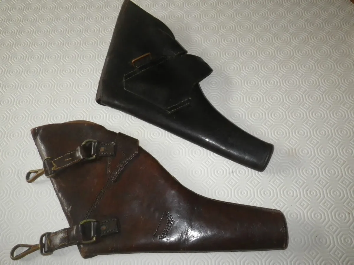 Two leather pistol holders