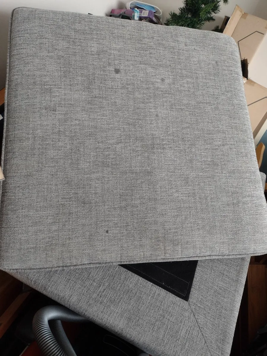 Large grey textured padded pouffe stool - Image 1