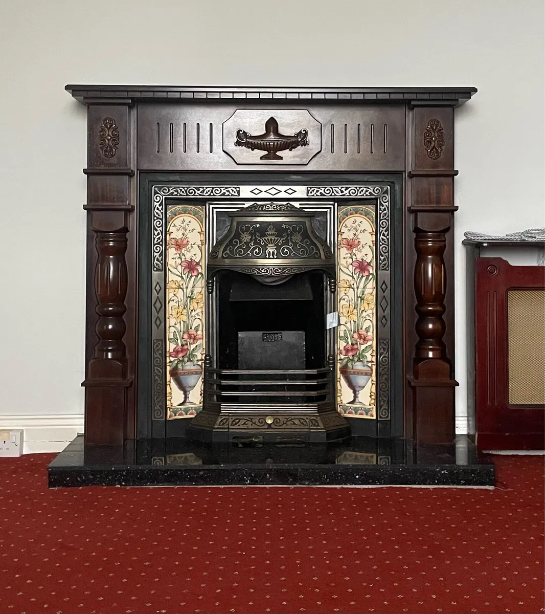 Fireplace with wood mantlepiece