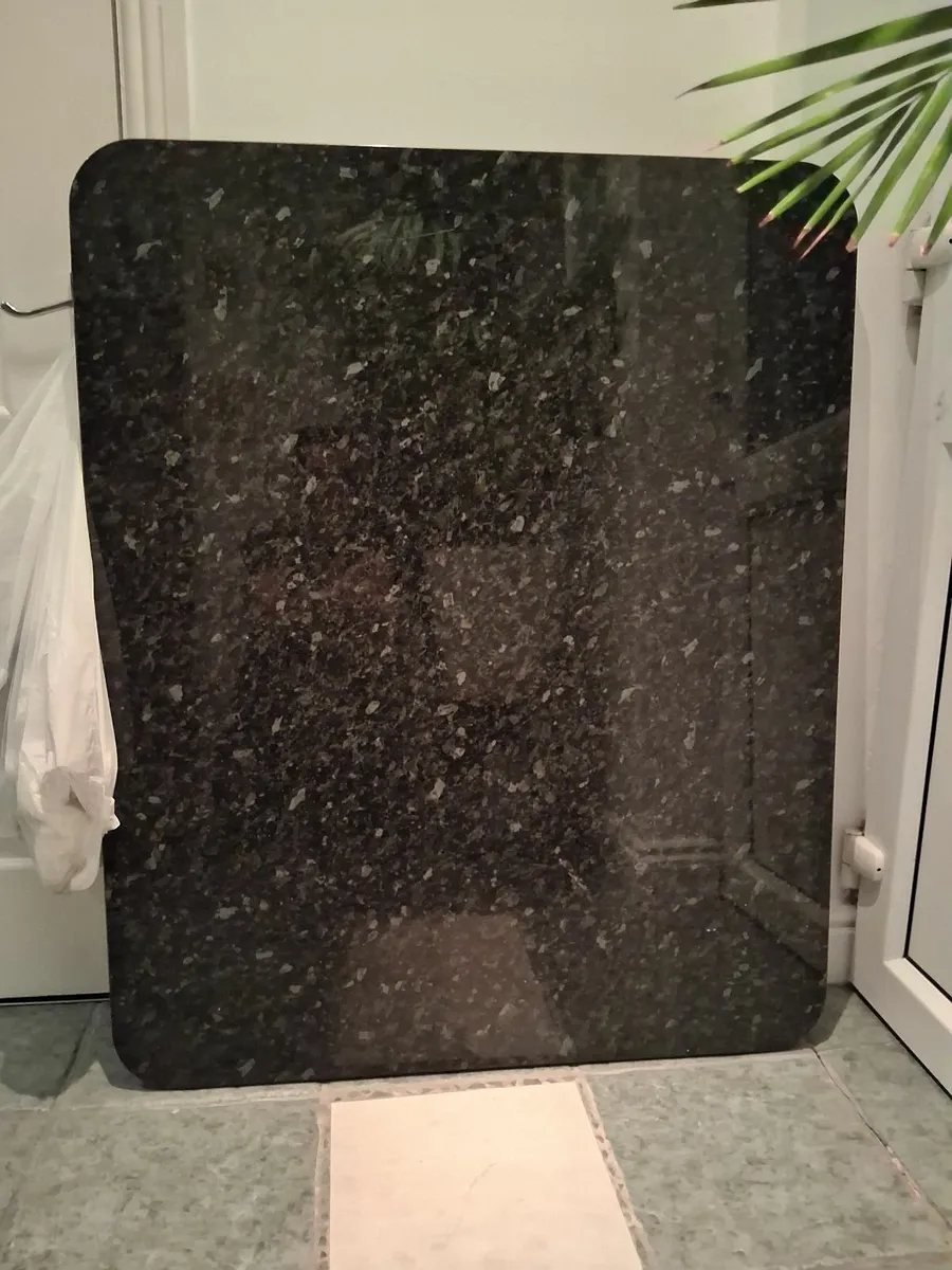 Curved black marble effect island counter top - Image 1