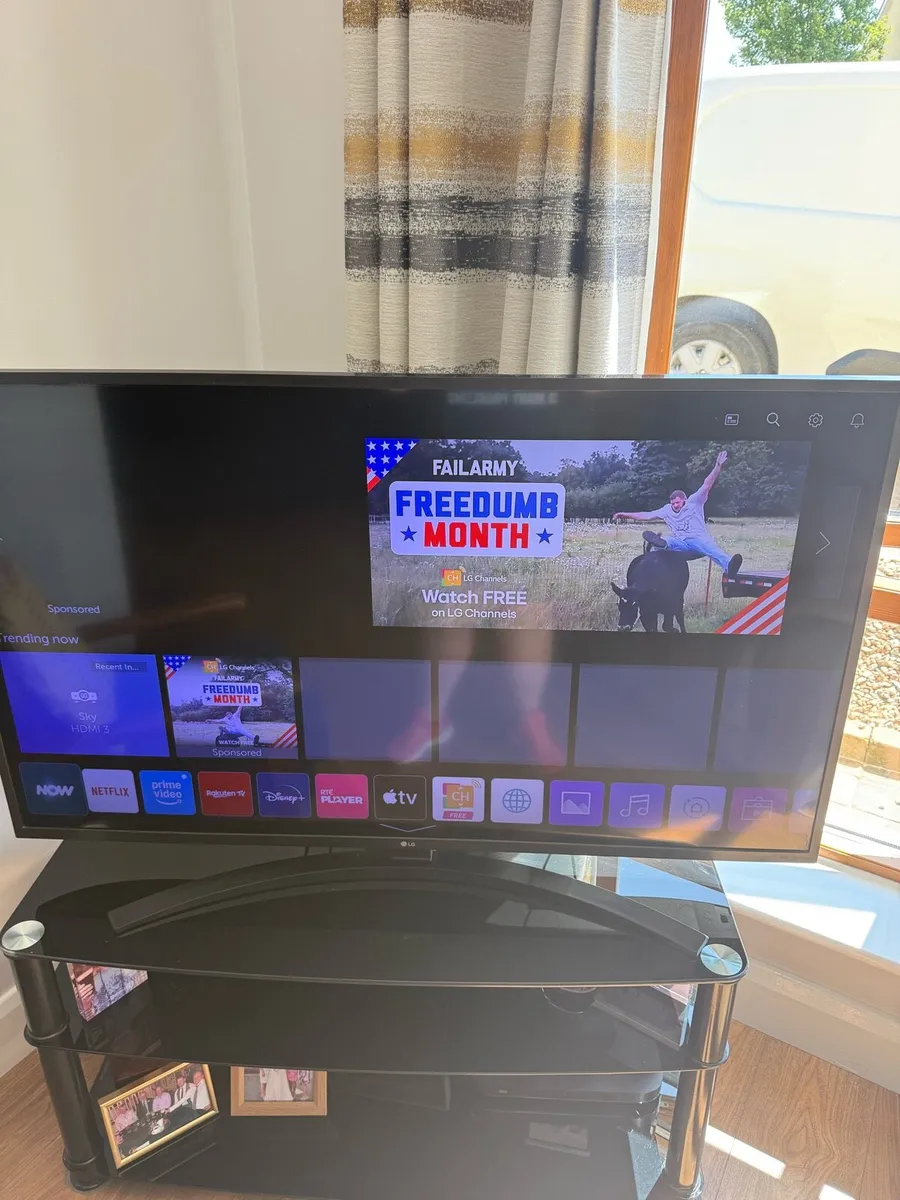 LG 50 HDR 4K Smart Tv & Table - Image 1