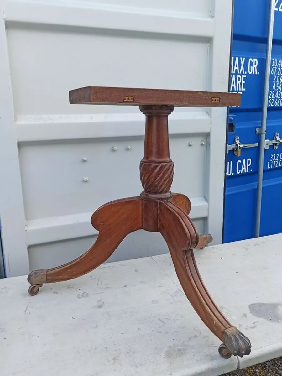 Vintage hardwood table base on 3 legs with brass claw foot castors - Image 1