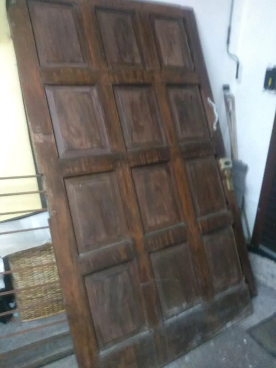 Teak garage doors Sorm Damaged, Free to Collect - Image 1