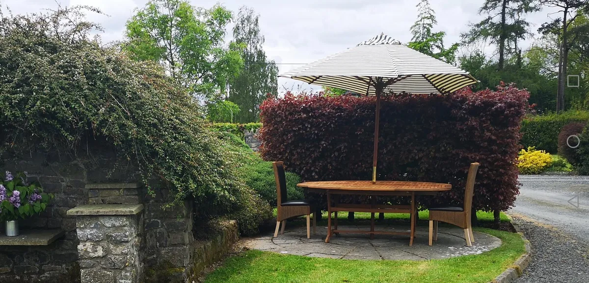 Unusual Oval Garden Table & Striped Parasol