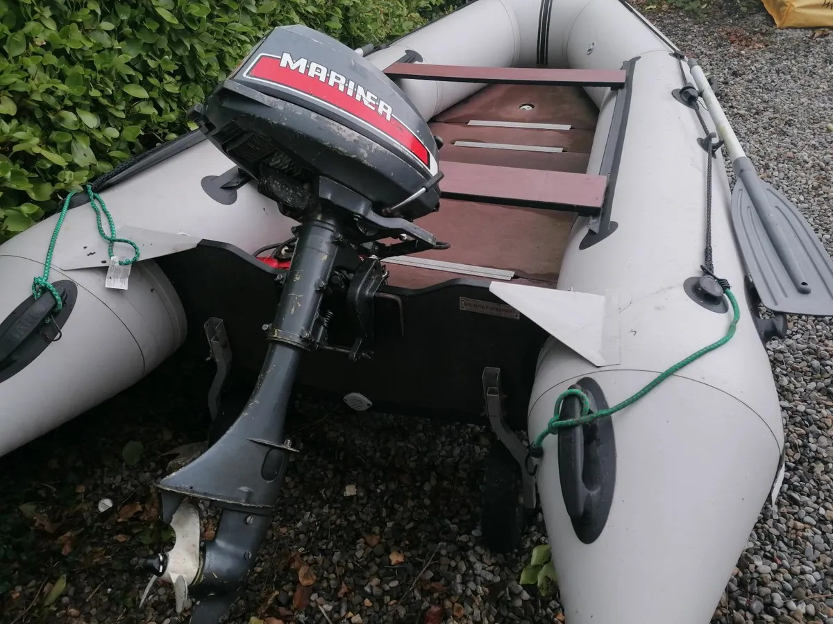 Boat and outboard engine - Image 1