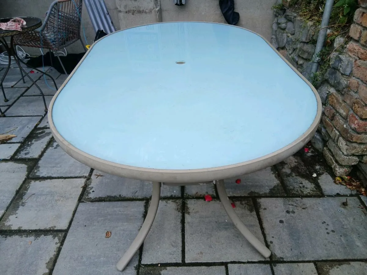 Patio table. - Image 1