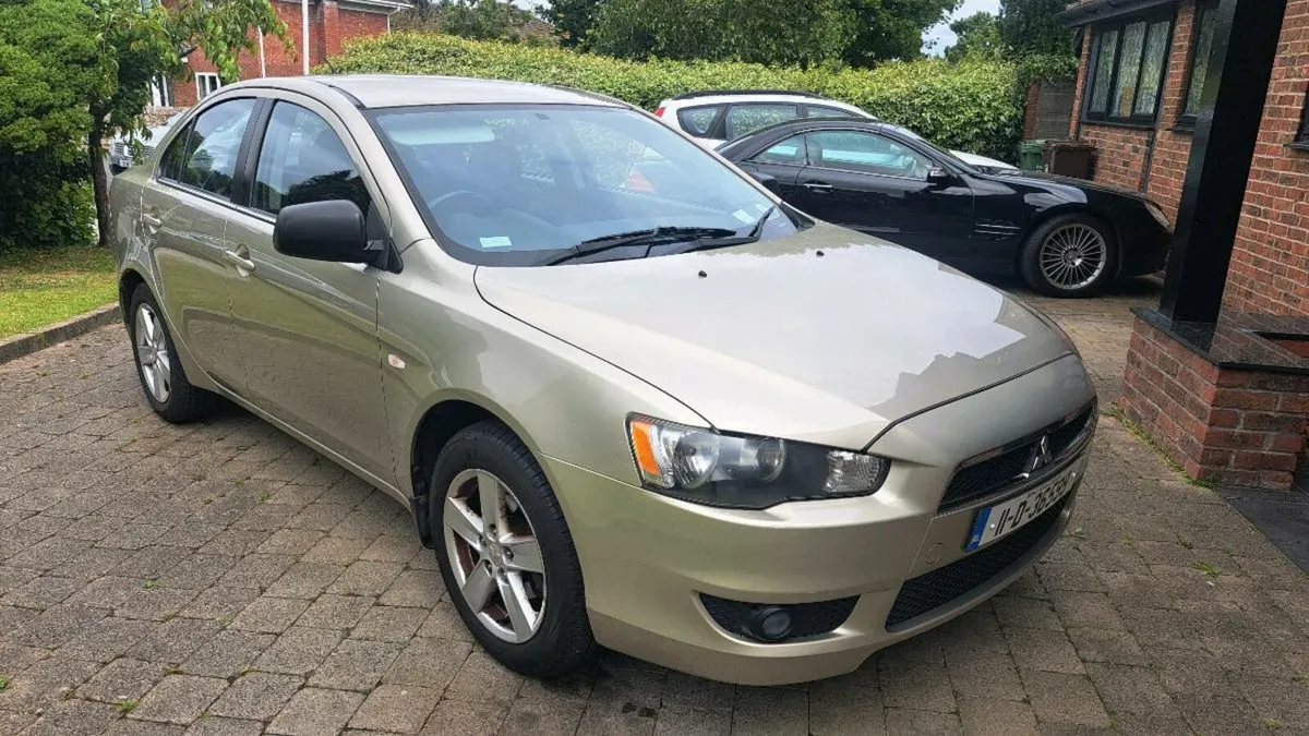 MITSUBISHI LANCER 1.5 PETROL 2011 VERY CLEAN CAR - Image 1