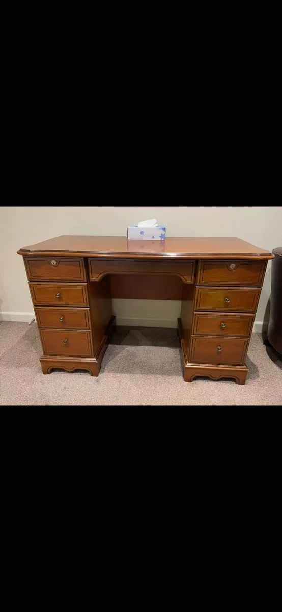 Writing table with drawers