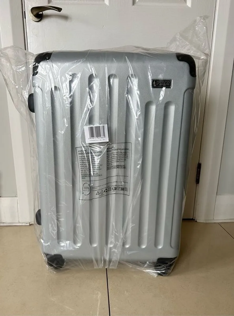 Large PSNGR suitcase - Image 1