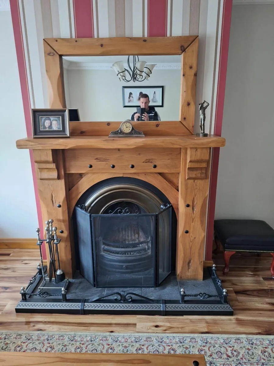 Fireplace and tables - Image 2