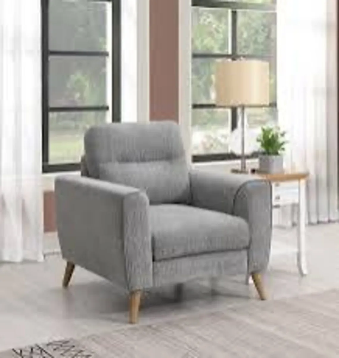 Sale price Anderson design armchair reduced to
