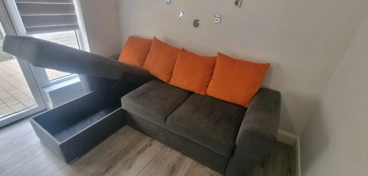 L shaped Sofa bed chaise longue dark grey fabric - Image 3