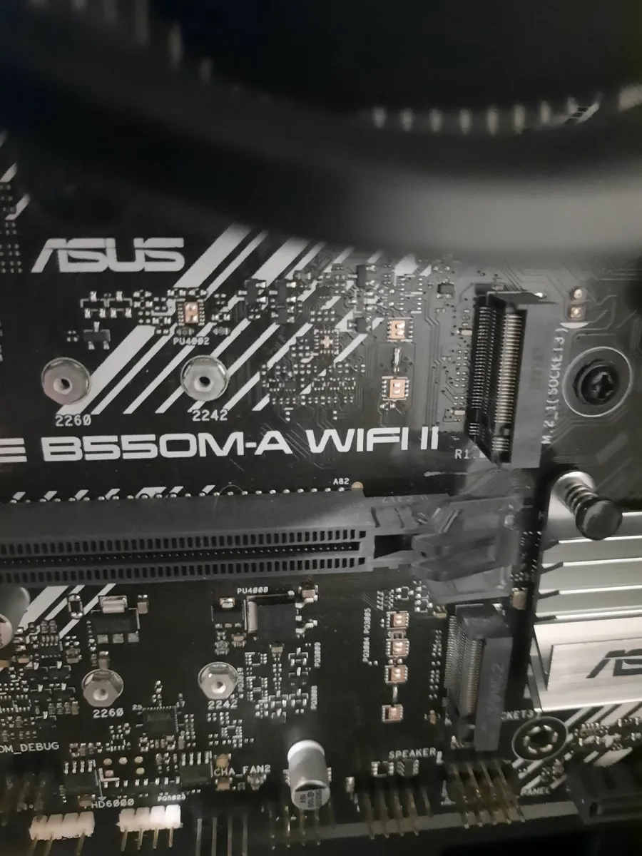 Computer case motherboard and fan - Image 1