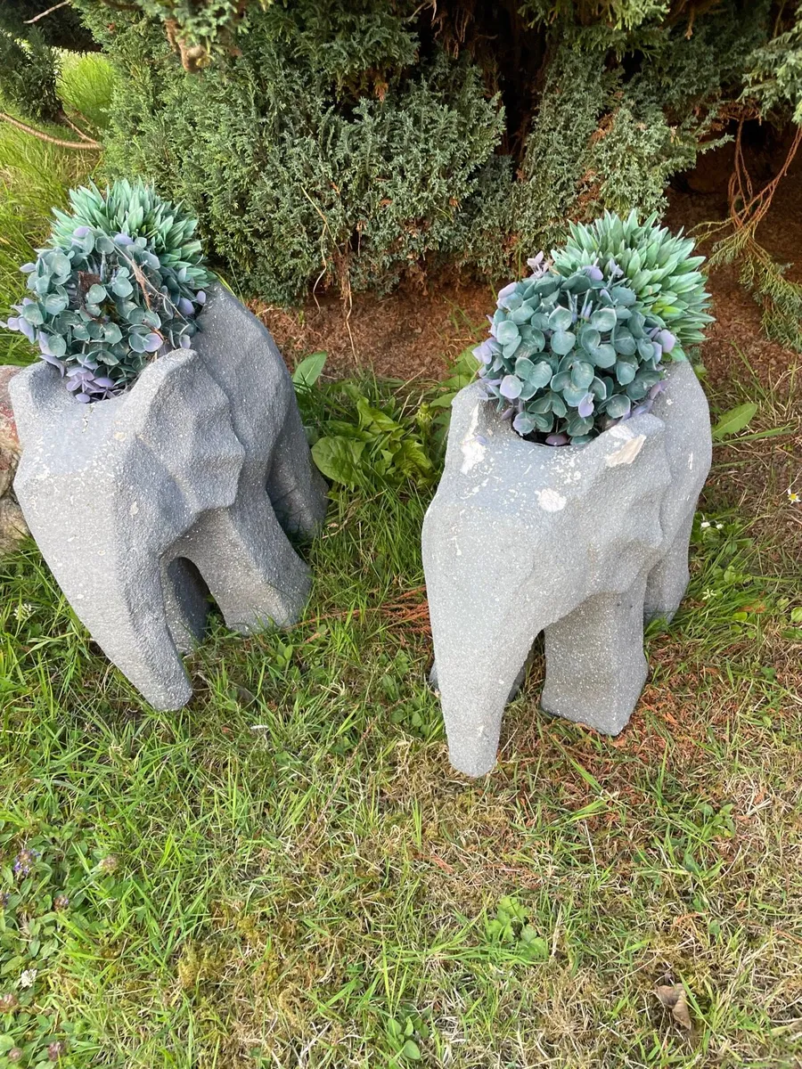 2 elephant plant holders
