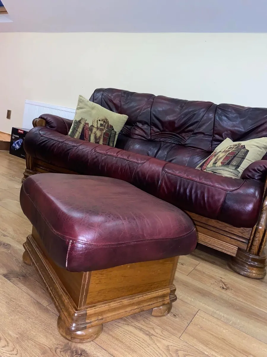 Leather 3 seater and 2 seater along with footstool - Image 1