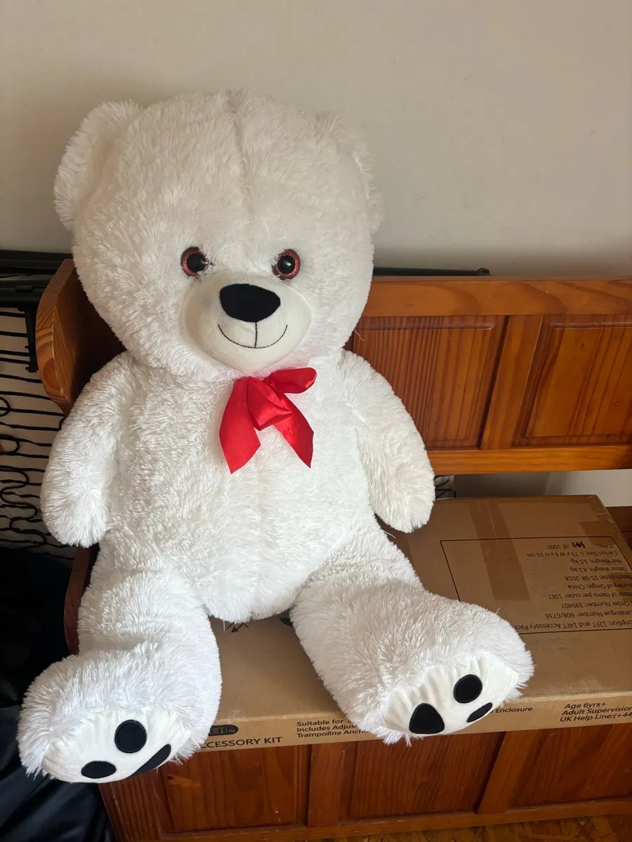 Large white teddy with red bow - Image 1