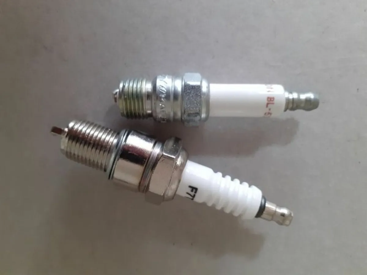 Spark plugs for ride on mower Long and short.
