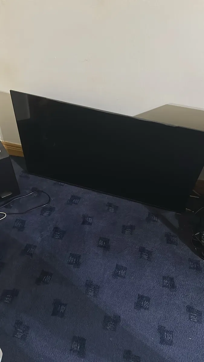 Smart tv and wall stand. New - Image 1