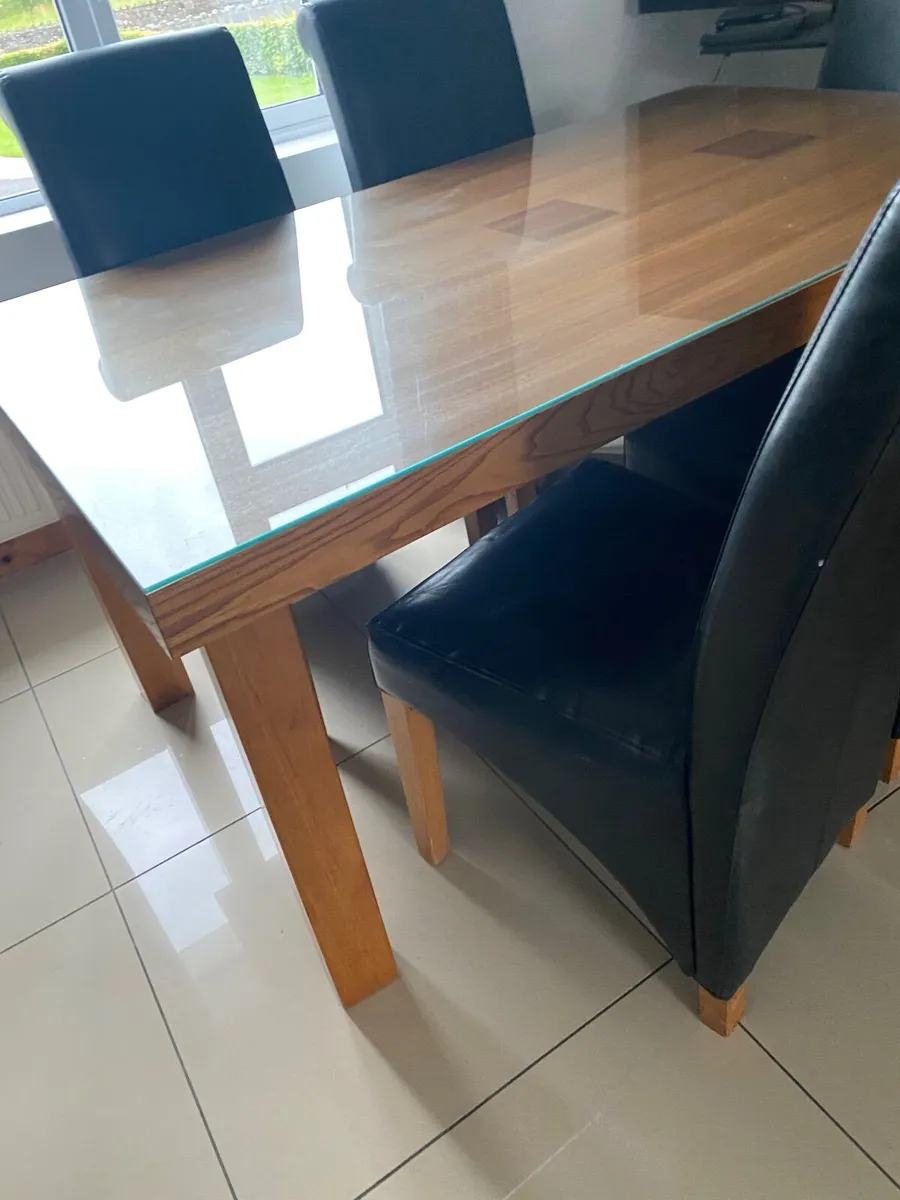 Solid wood table with glass top 8 chairs - Image 2