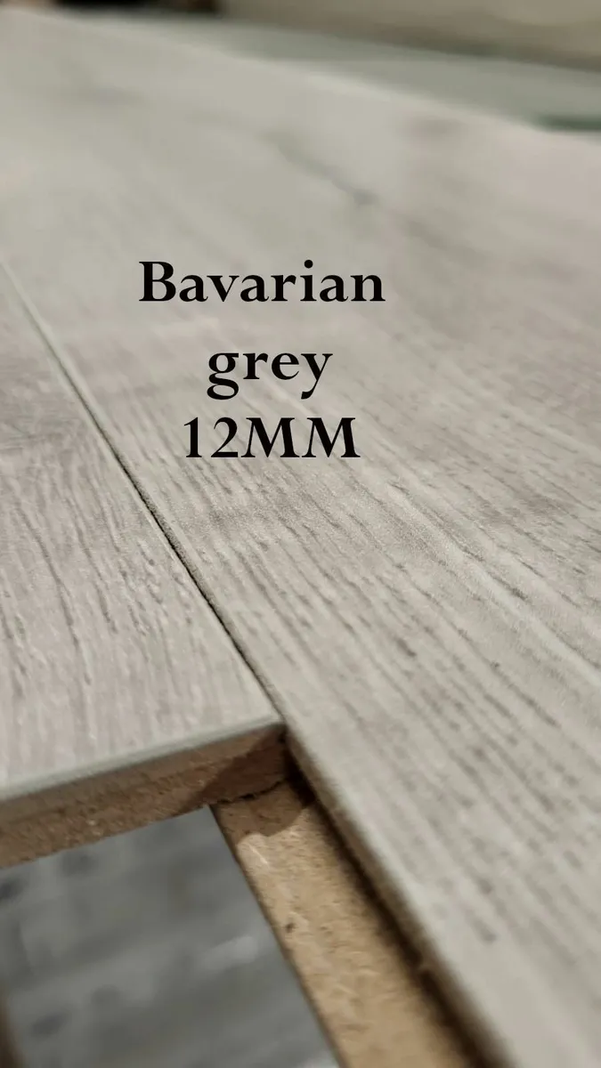 Durable 12mm Matte Finish Laminated Click Flooring - Image 1