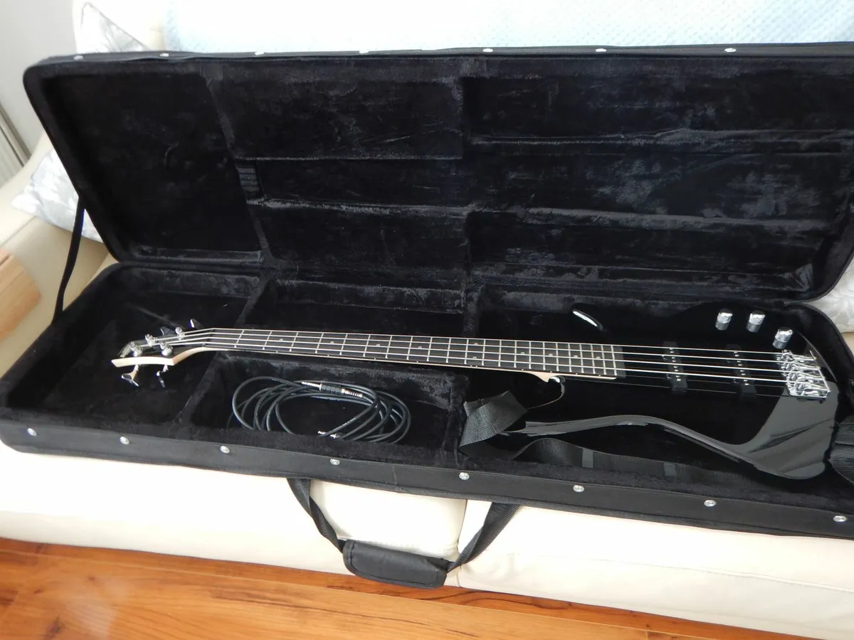 BASS GUITAR WITH HARD CASE - Image 1