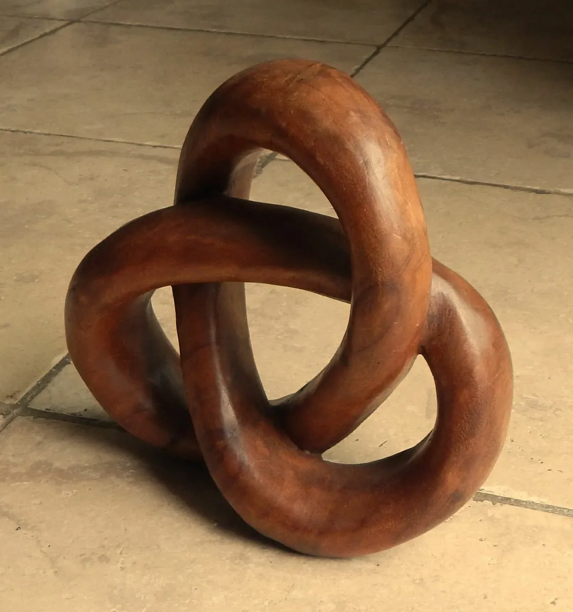 Carved Wood Knot Sculpture - Image 1