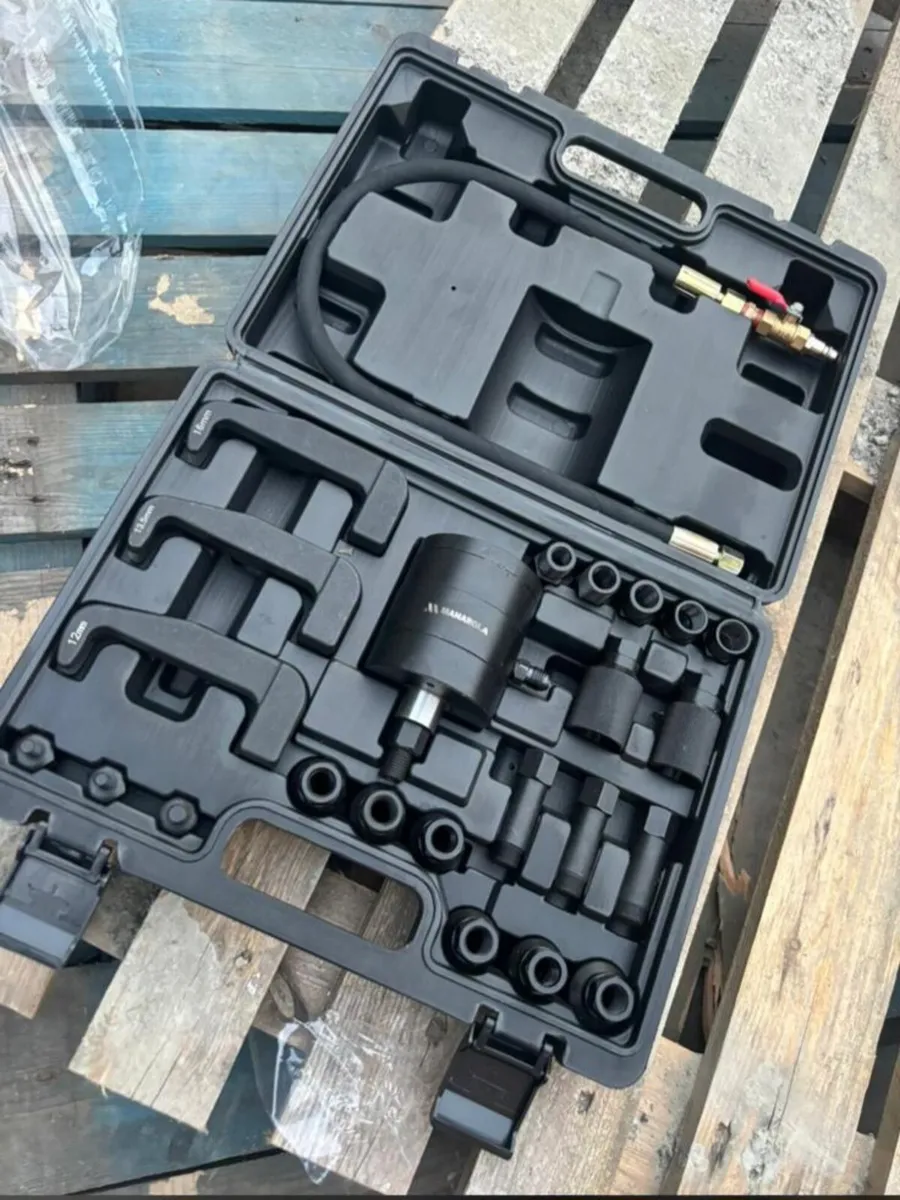 Injector removel tool